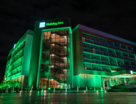 Holiday Inn Nairobi showing its building at nigh