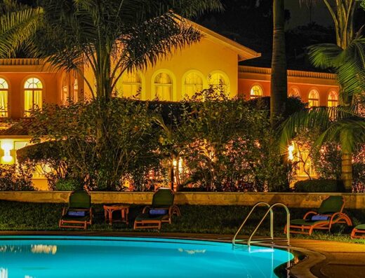 House of Waine showing a pool view of the hotel